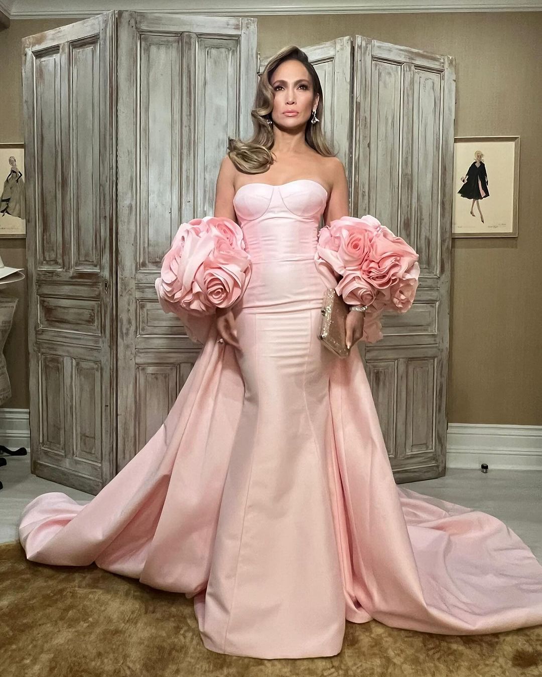 Jennifer Lopez wows in blooming Barbie-pink dress at 2024 Golden