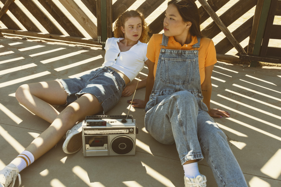 Full shot girls with cassette player