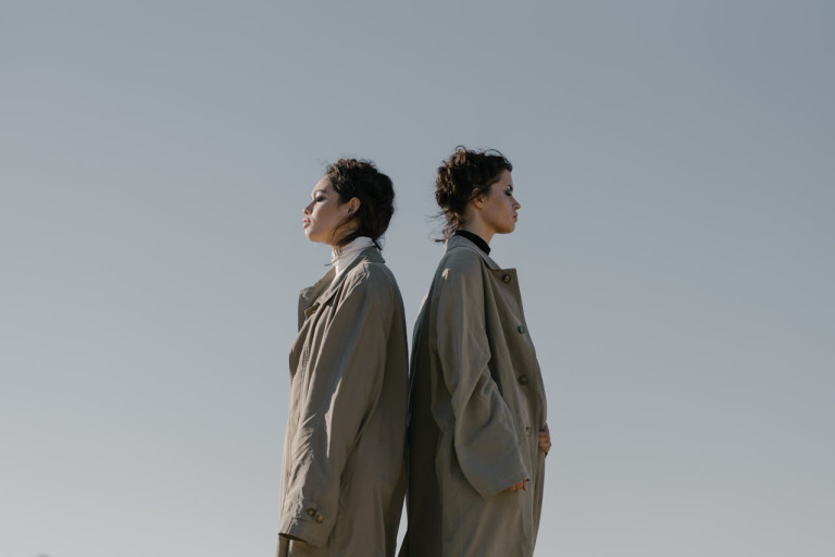 Man in Brown Coat Standing