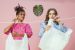 Two Women Hanging Plastic Bags on the Clothesline