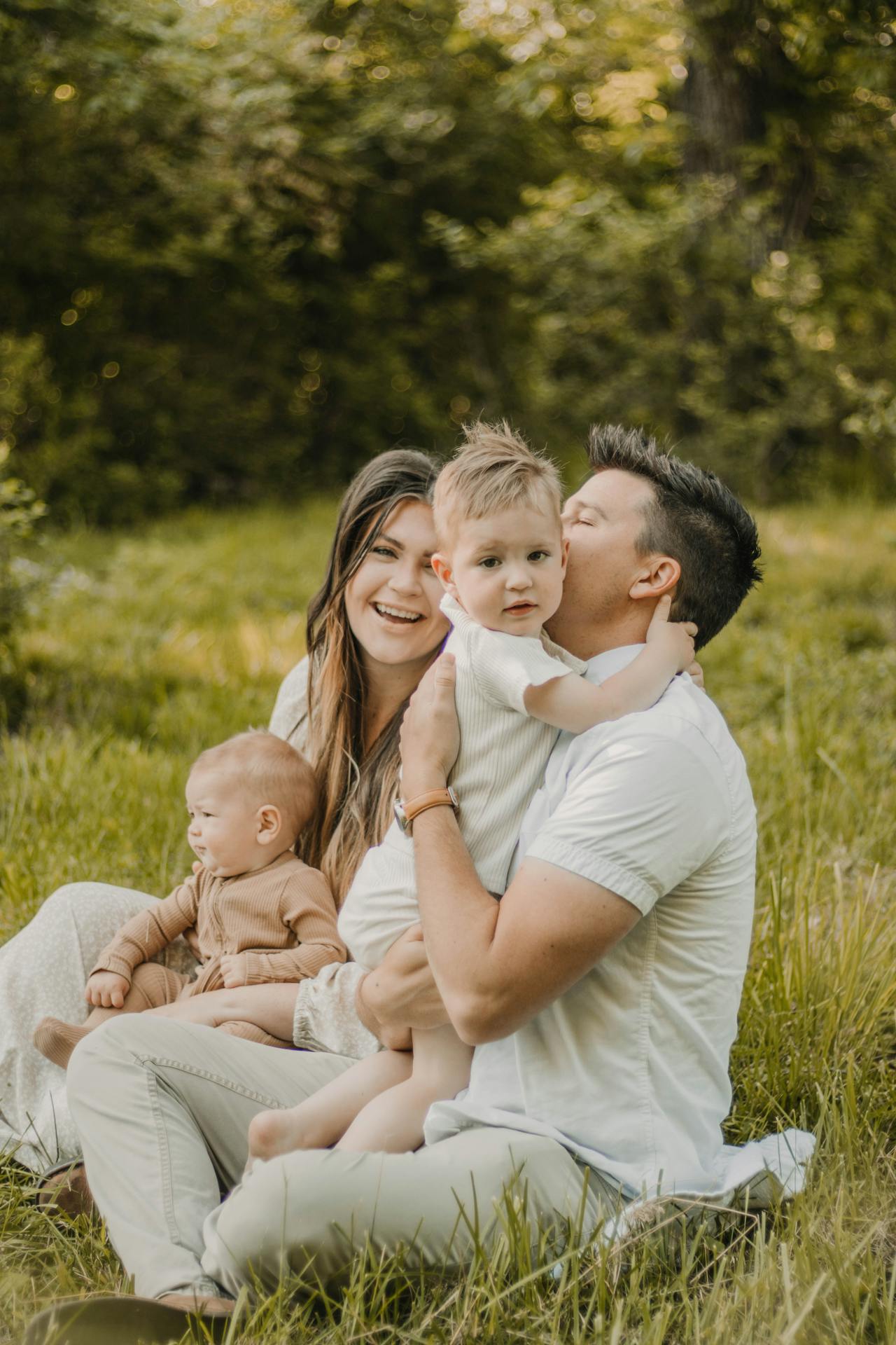 Charming Family Portrait in Lush Greenery
