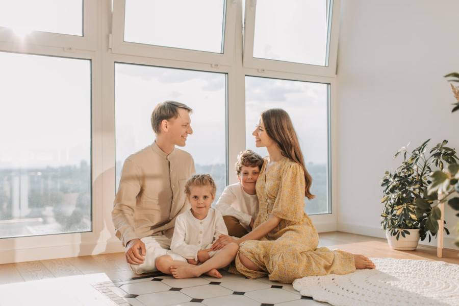 A Family Sitting on the Floor