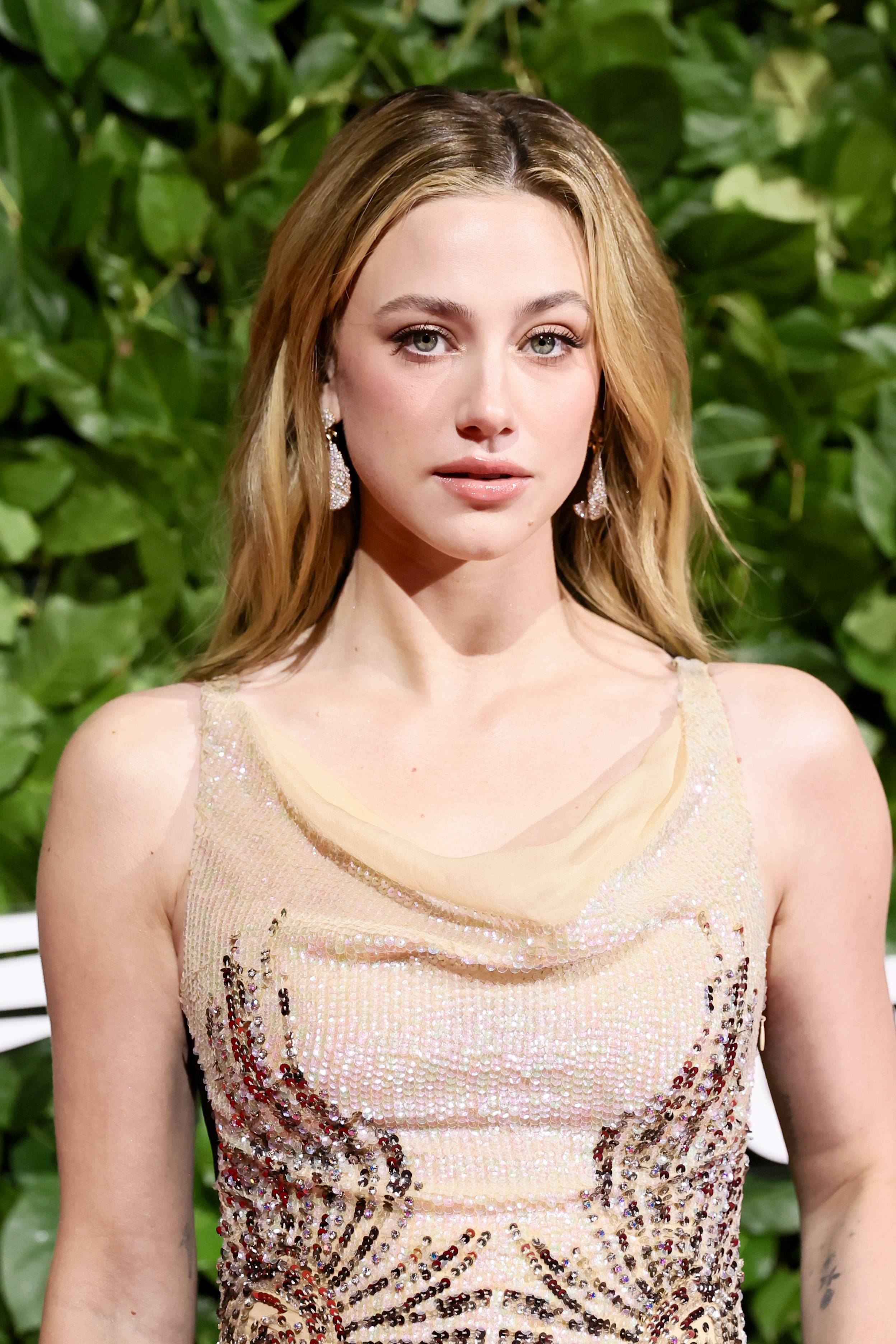 Lili Reinhart Wears a 2000s Caché Dupe of Kate Hudson's Iconic Yellow Gown